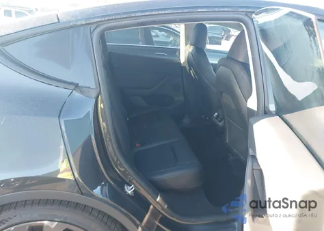 2024 Tesla Model Y Performance Dual Motor All-Wheel Drive z USA, uszkodzony, nr VIN 7SAYGDEF9RF054062